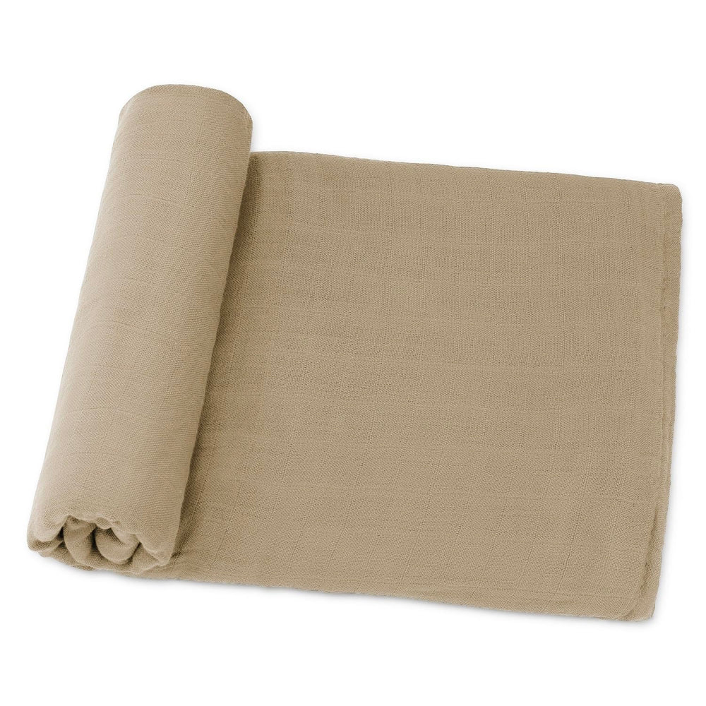Comfy Cubs muslin swaddle blanket in Cedar with soft texture for delicate skin.