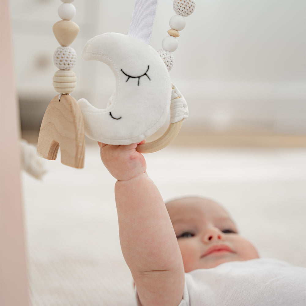 Natural finish blends with nursery decor while remaining sturdy and child-safe.