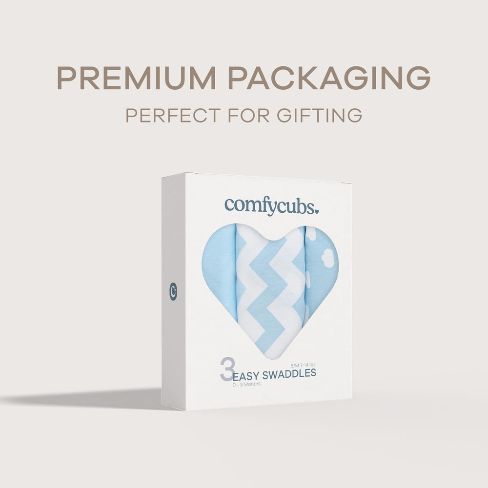 Comfy Cubs newborn swaddle blue features secure Velcro wrap for safe, snug rest.