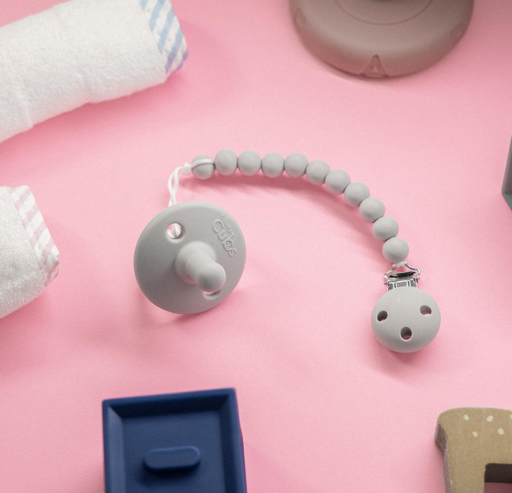 Comfy Cubs lightweight clip holds pacifiers securely without weighing down outfits.
