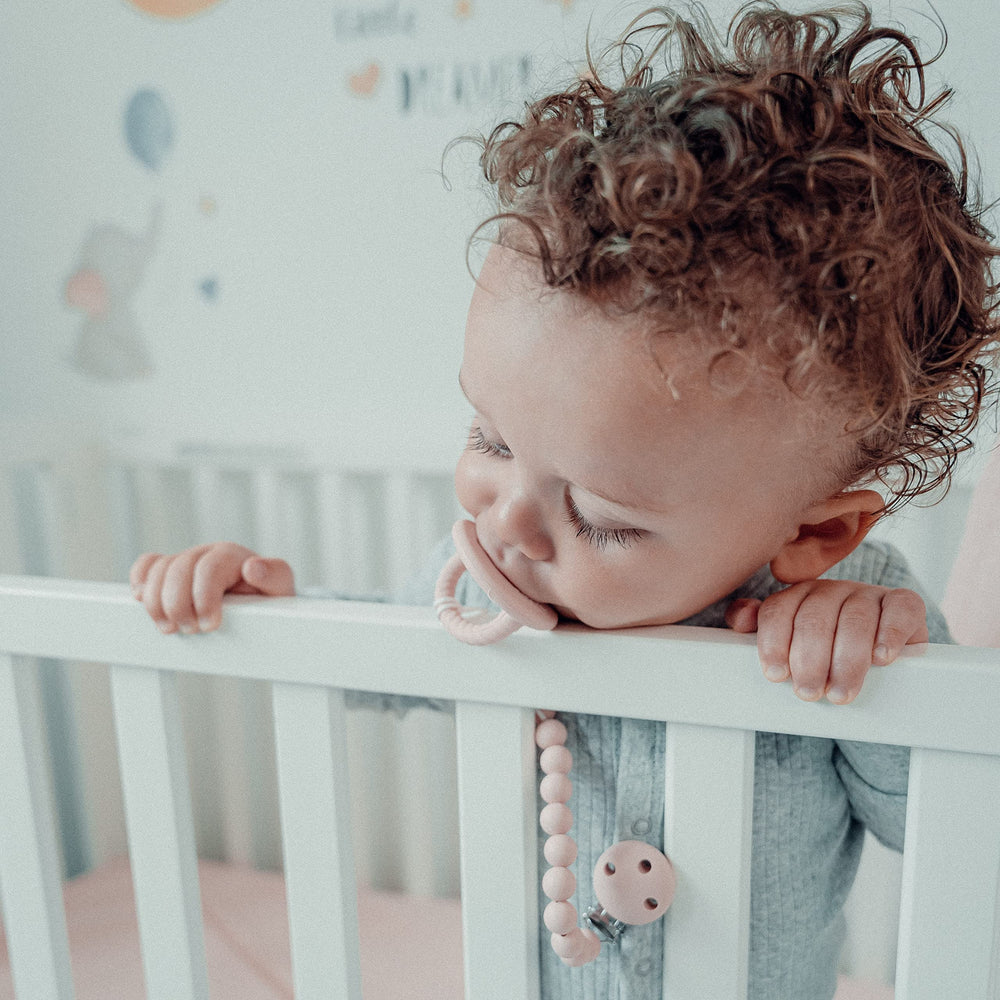 Comfy Cubs 2-pack pacifier clips for easy swapping between outfits.