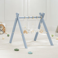 Comfy Cubs wooden play gym with natural finish top view shows a safe pinewood surface.