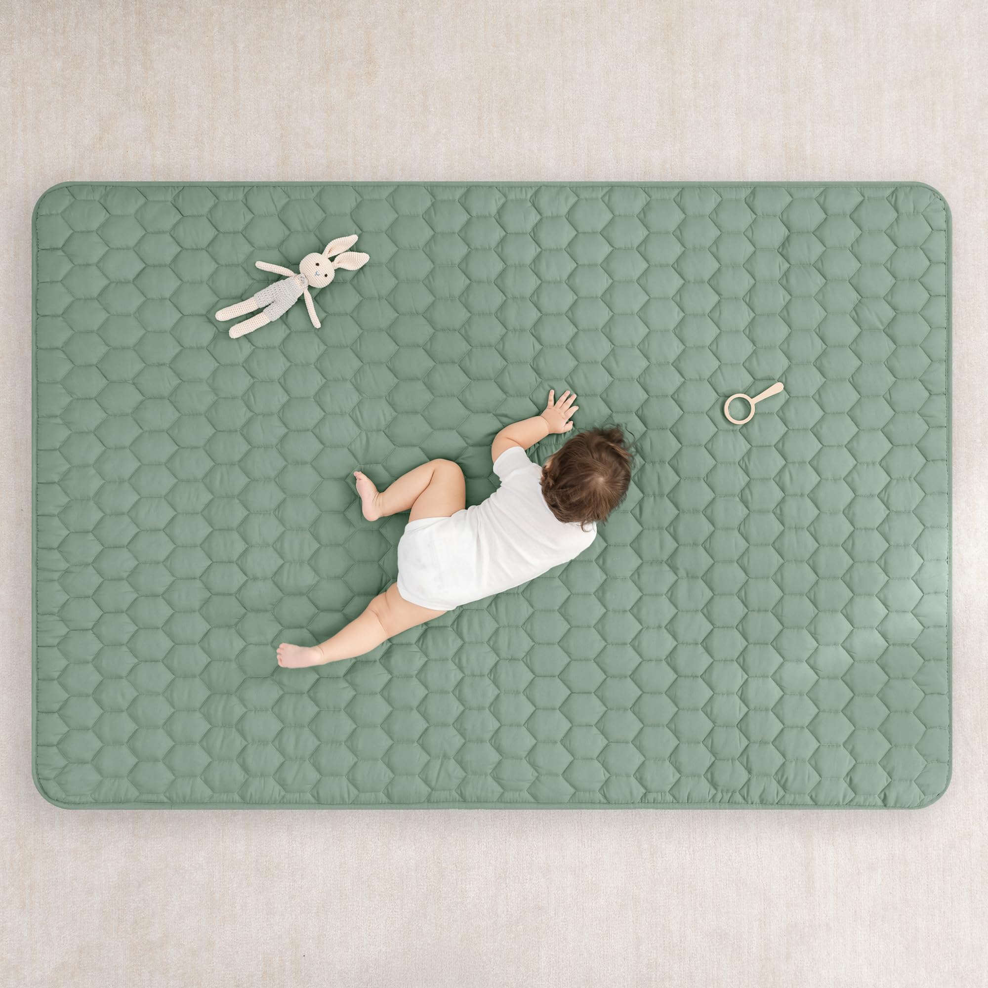 Comfy Cubs rectangle play mat closeup, quilt stitching for cushioned comfort.