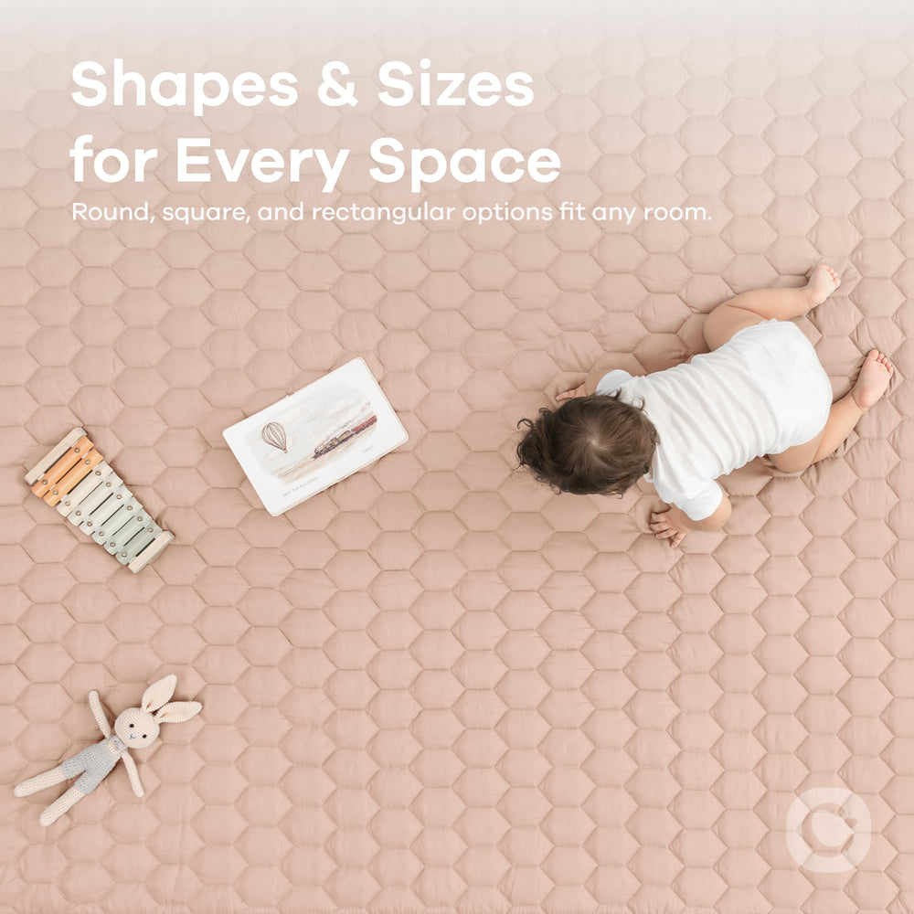 Nursery setup shows Comfy Cubs mat creating a cozy play space.