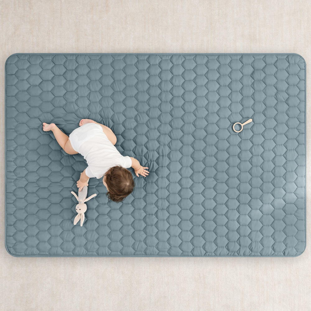 Non-slip bottom with grip pad keeps the Comfy Cubs mat in place during active play