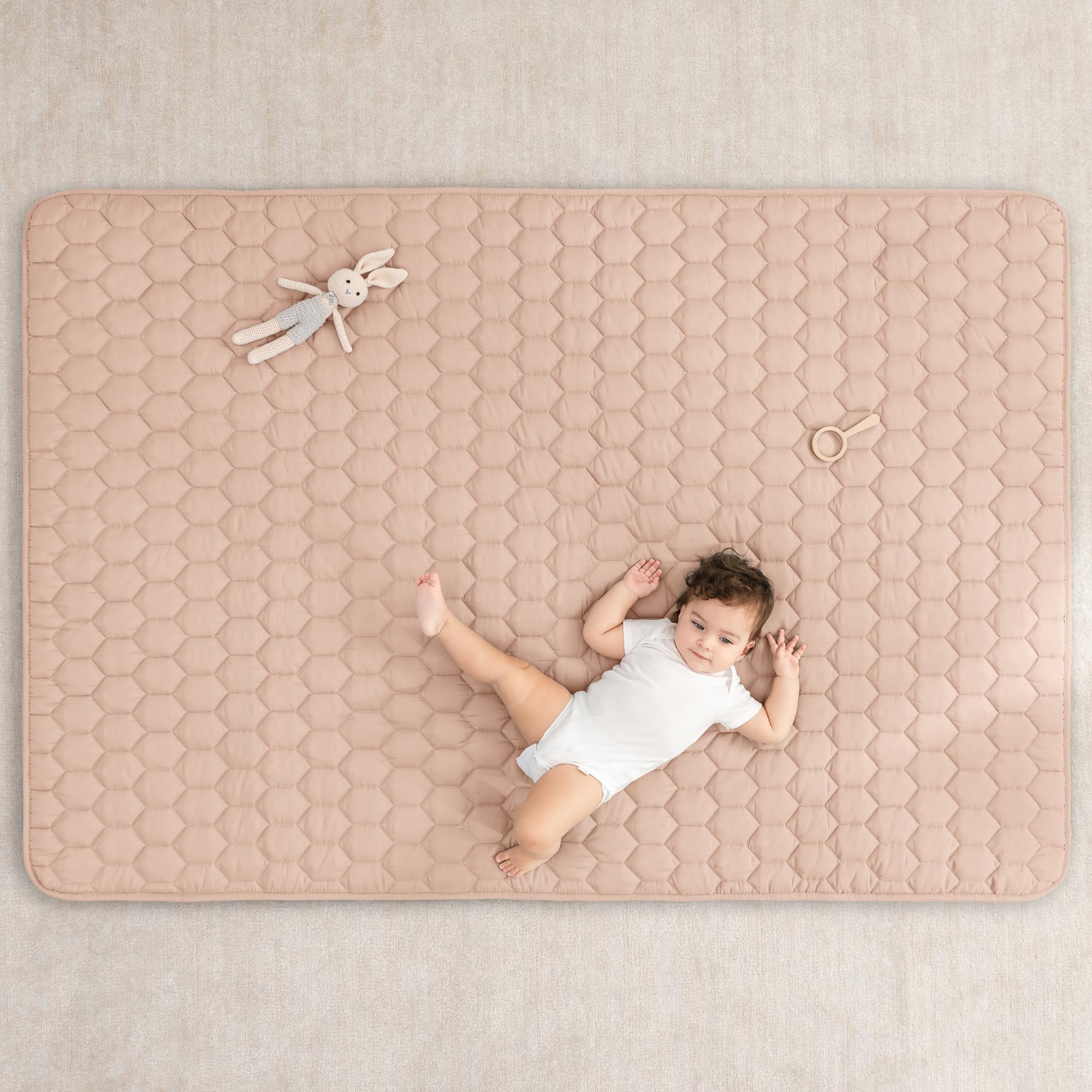 Non-slip bottom keeps the mat stable on smooth floors for safe play.