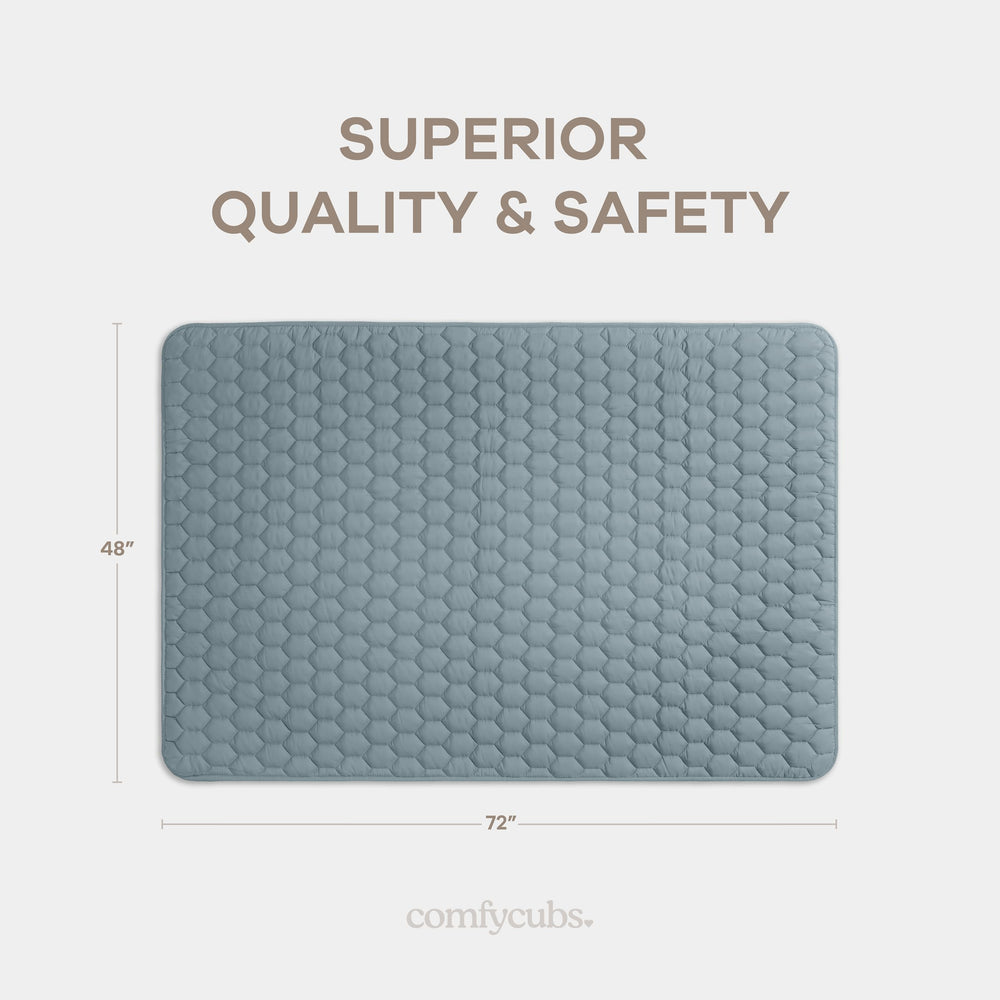 Quilted top on Comfy Cubs mat provides extra padding for comfortable rolls and crawls