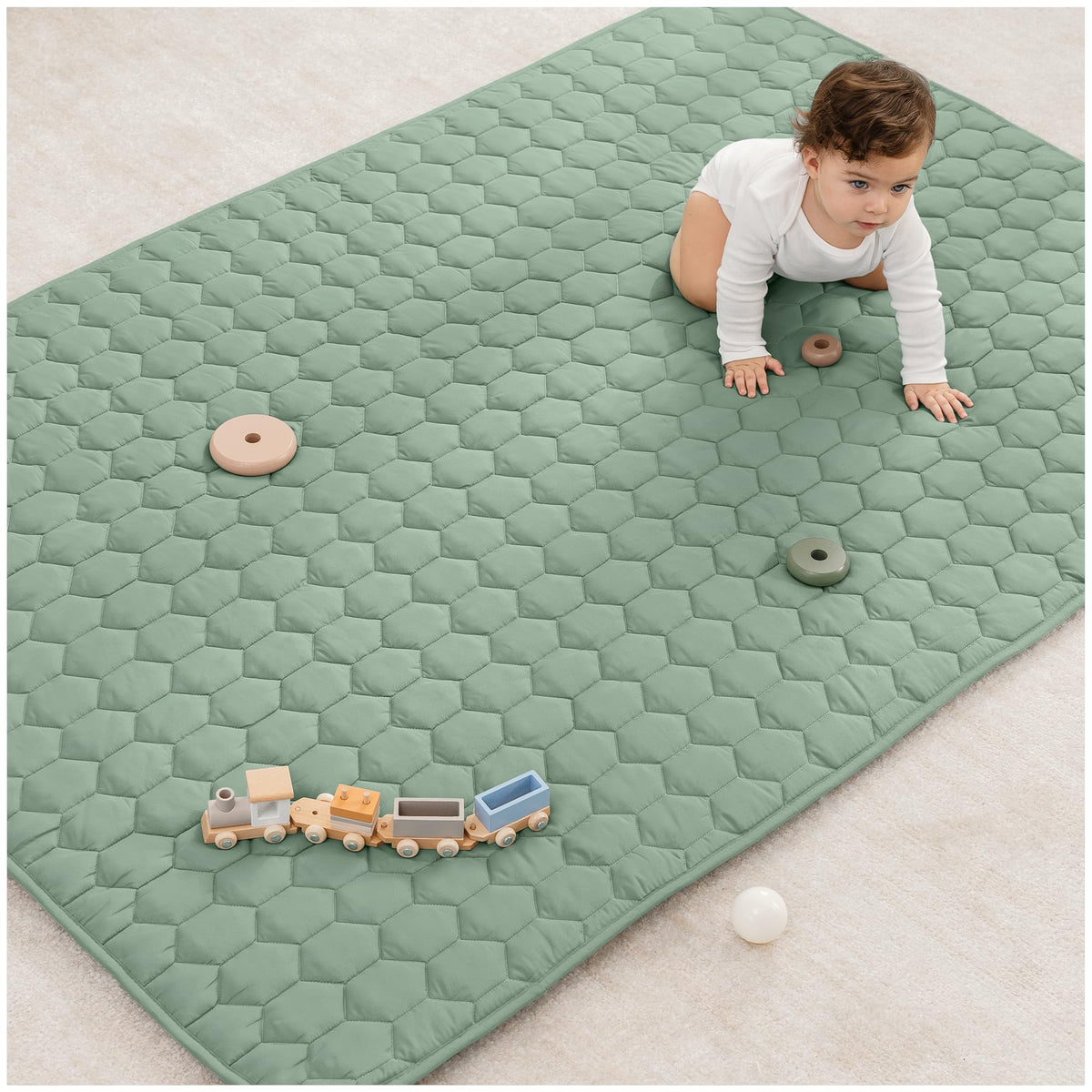 Comfy Cubs rectangle play mat, top view, quilted surface ideal for early crawls.