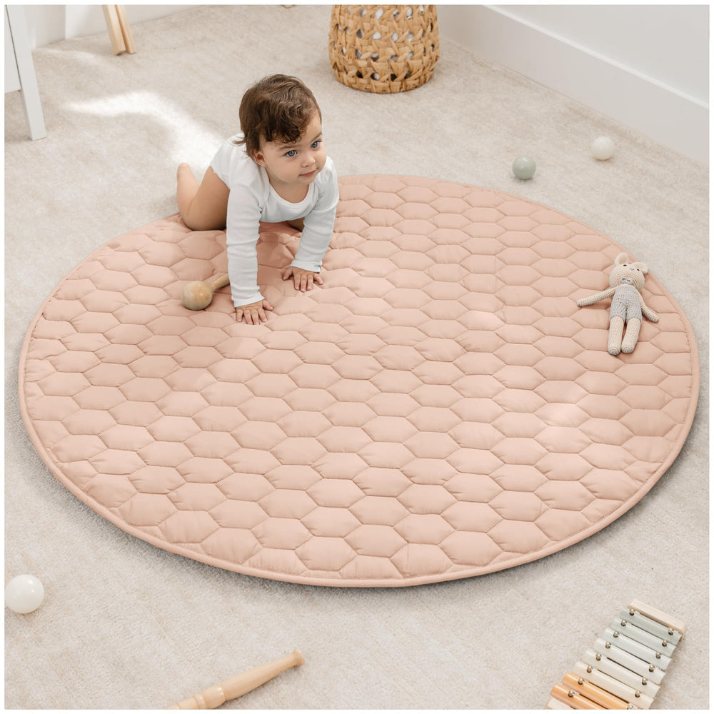 Comfy Cubs round play mat 48-inch soft plush surface for cozy crawling.
