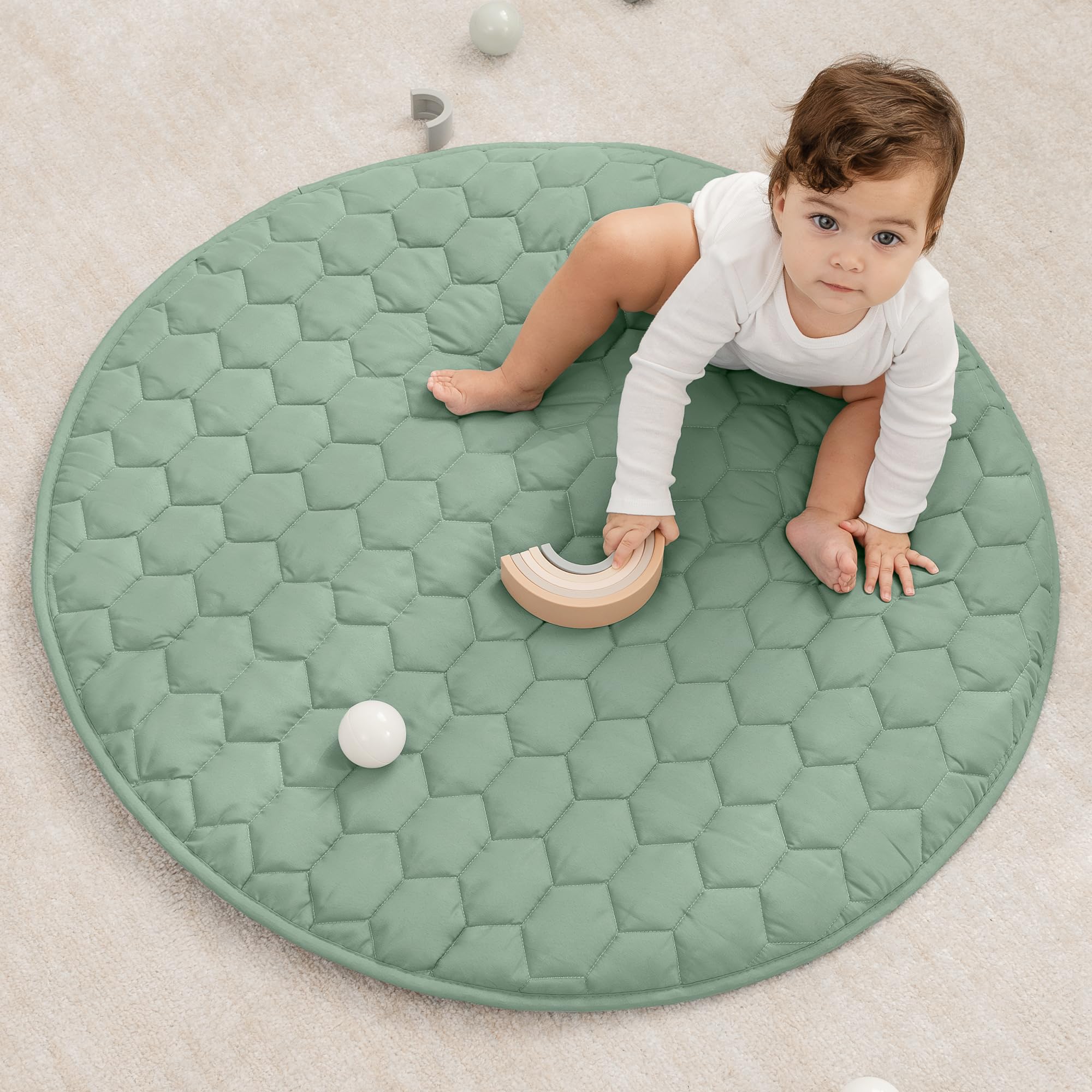 Comfy Cubs round play mat in Fern color, soft surface for safe crawling
