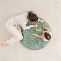 Quilted Fern round mat cushions tummy time and crawls