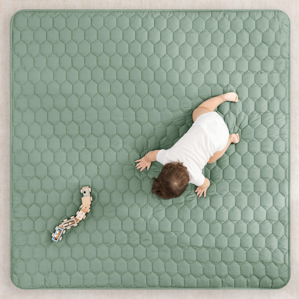 Comfy Cubs square play mat 56x56 with quilted padding for extra comfort.