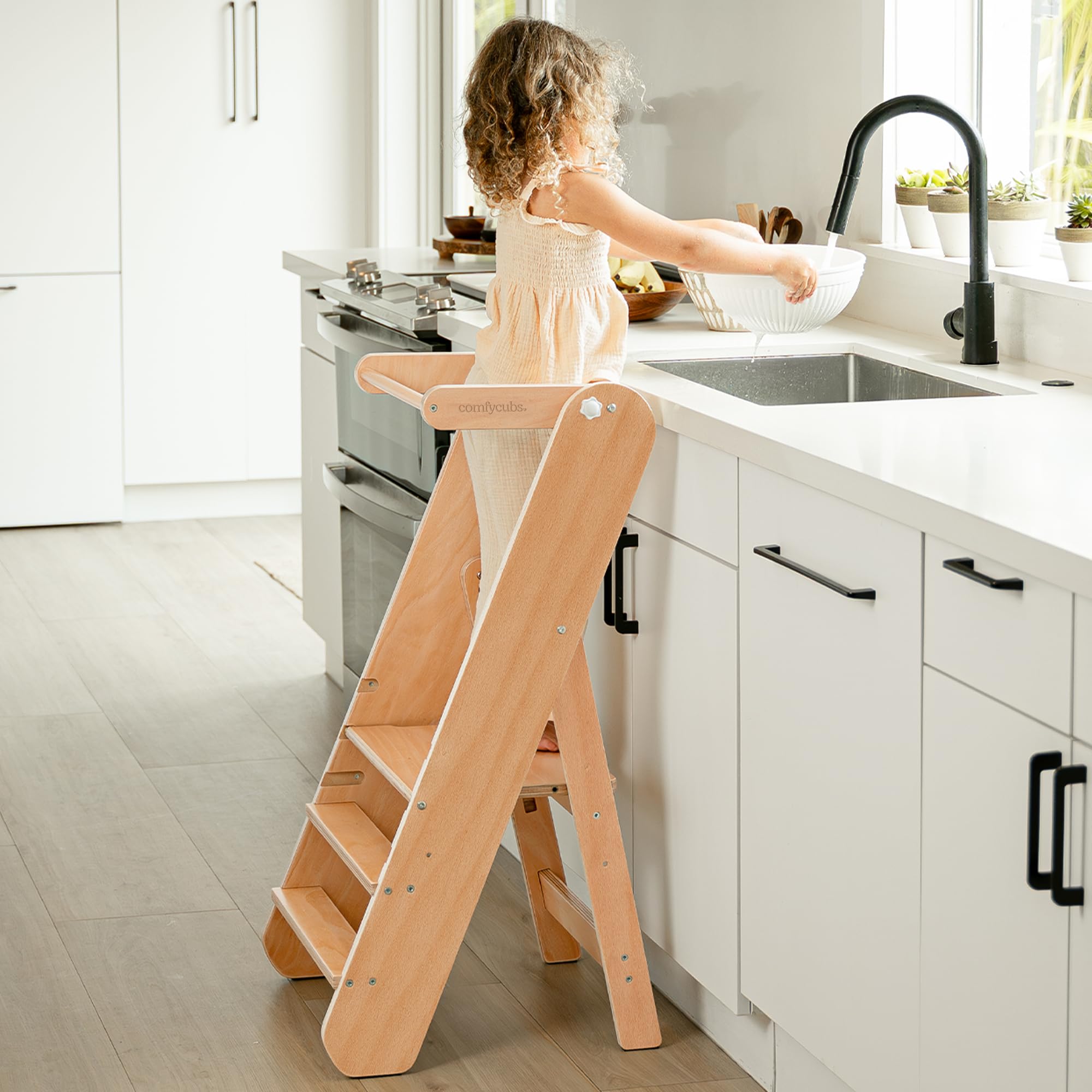 Comfy Cubs step stool showing three height levels for growing toddlers.