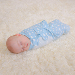 Comfy Cubs blue swaddle with Velcro offers a secure, adjustable fit for calm naps and bedtime.