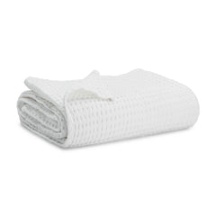 Comfy Cubs waffle weave blanket shows soft texture for cozy warmth all year.
