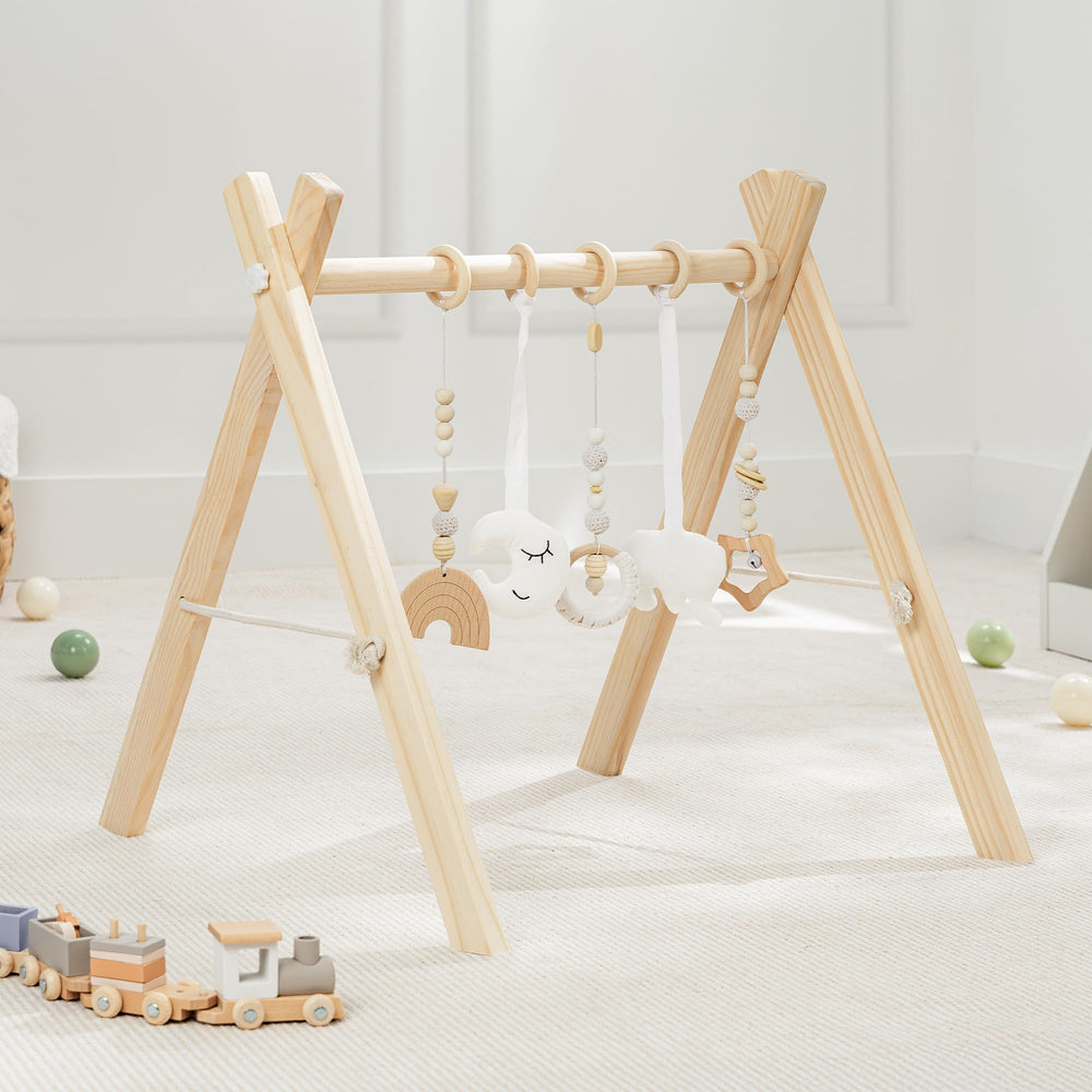 Comfy Cubs wooden baby play gym with natural pinewood finish for safe tactile exploration