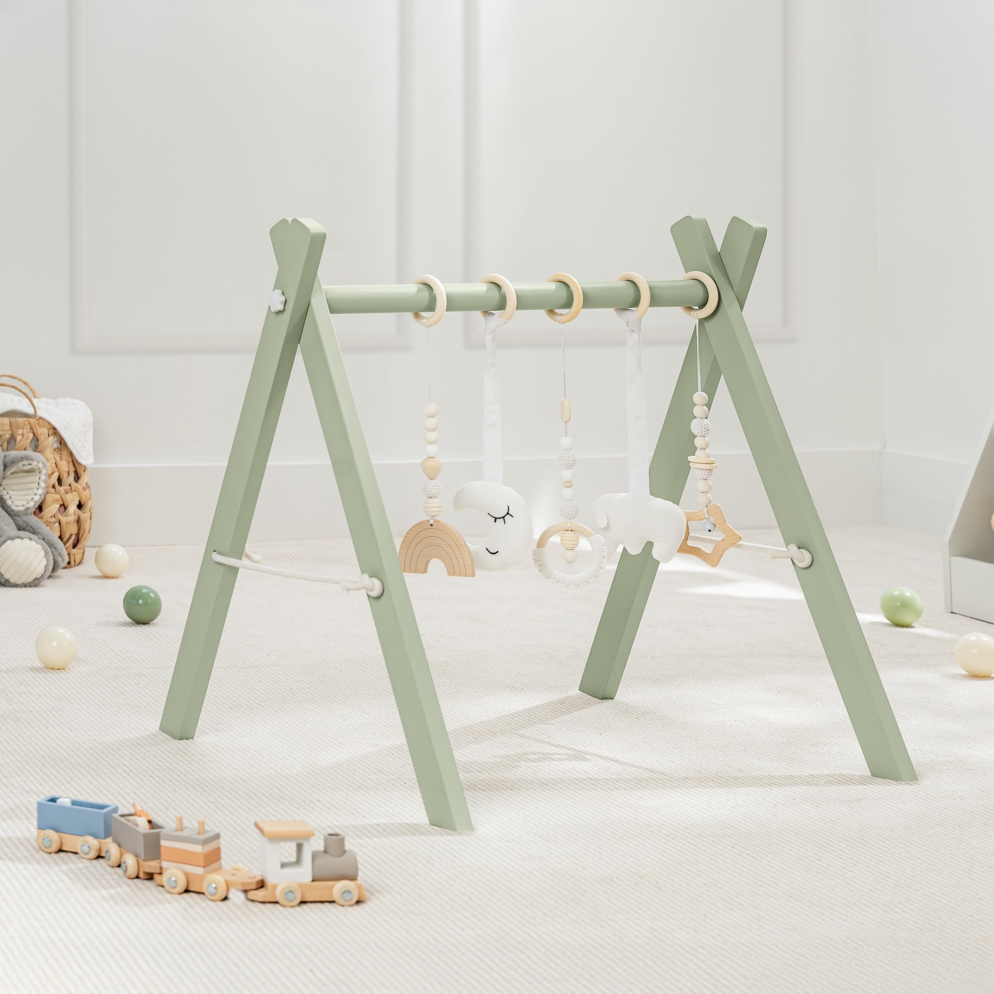 Comfy Cubs wooden baby play gym in natural finish promotes safe tummy time and exploration.