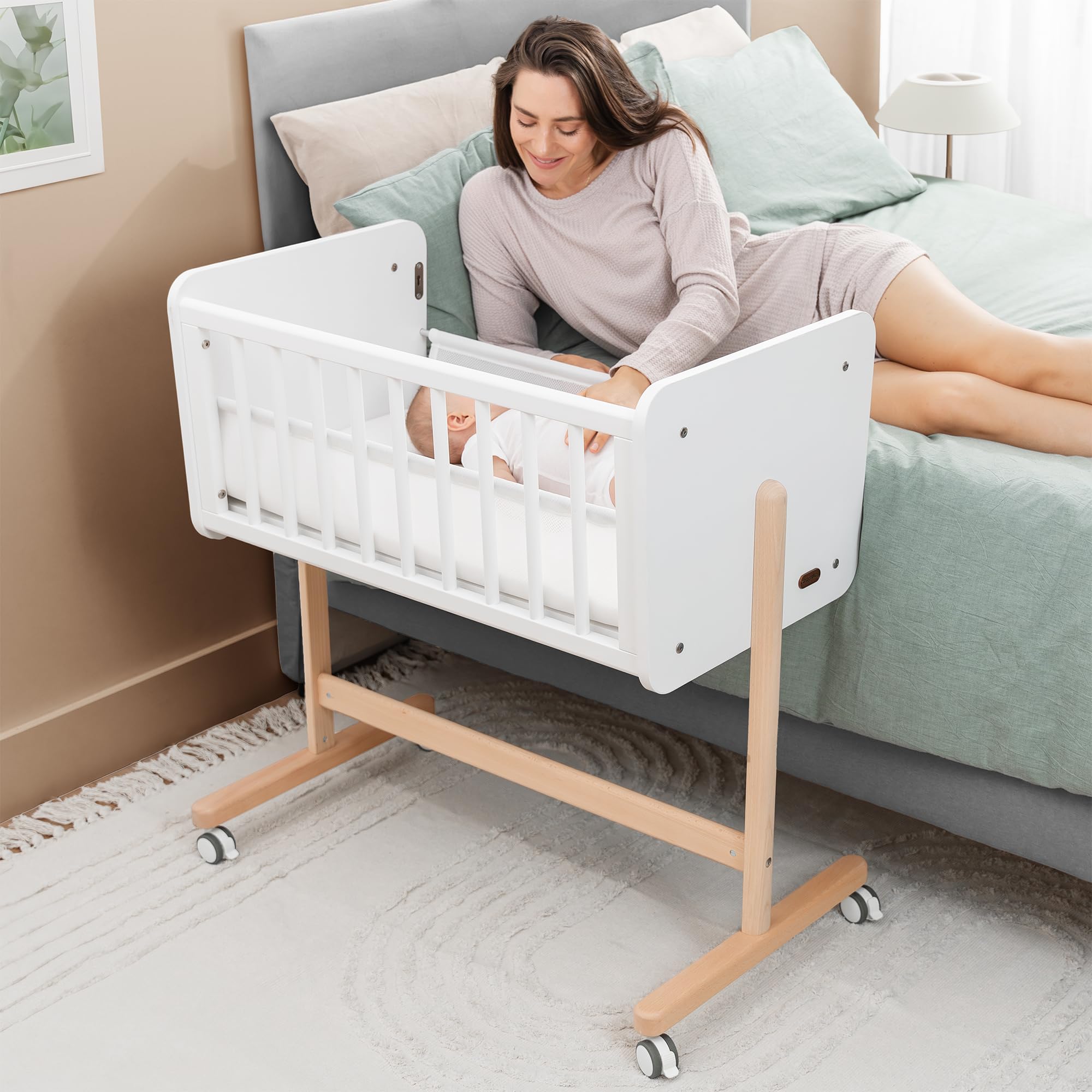 Comfy Cubs wooden bedside bassinet with side rail closed for secure newborn sleep