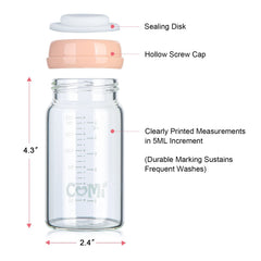 Close-up of pink lid on COMI bottle highlighting brand and color.