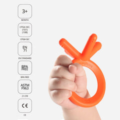 Comotomo orange silicone teether uses safe food-grade material.