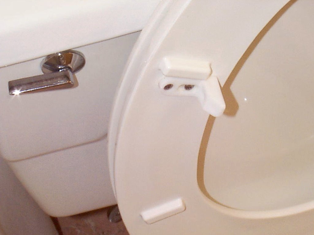 COMPAC HOME safe-t-bumpers-white-set demonstrates wobble-free seating in bathroom.