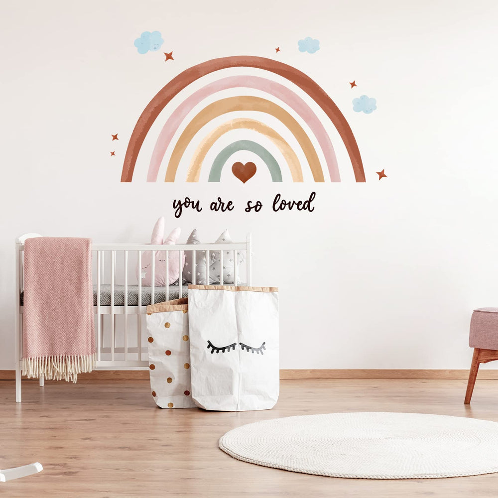 Containlol Rainbow wall decal nursery charm with warm color touches.