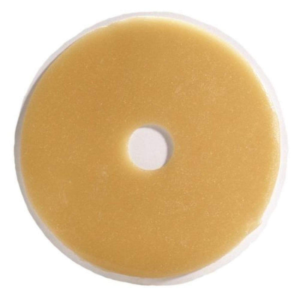 ConvaTec Eakin Cohesive Slim Ostomy Seal, 2-inch diameter, molded to uneven skin surfaces to reduce gaps.