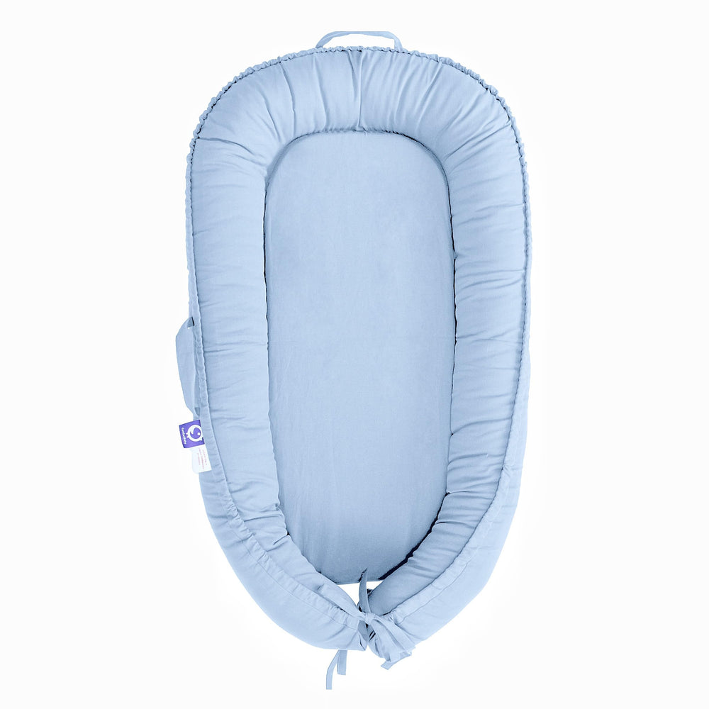 CooCooBaby infant lounger blue, front view, cozy support for early moments.