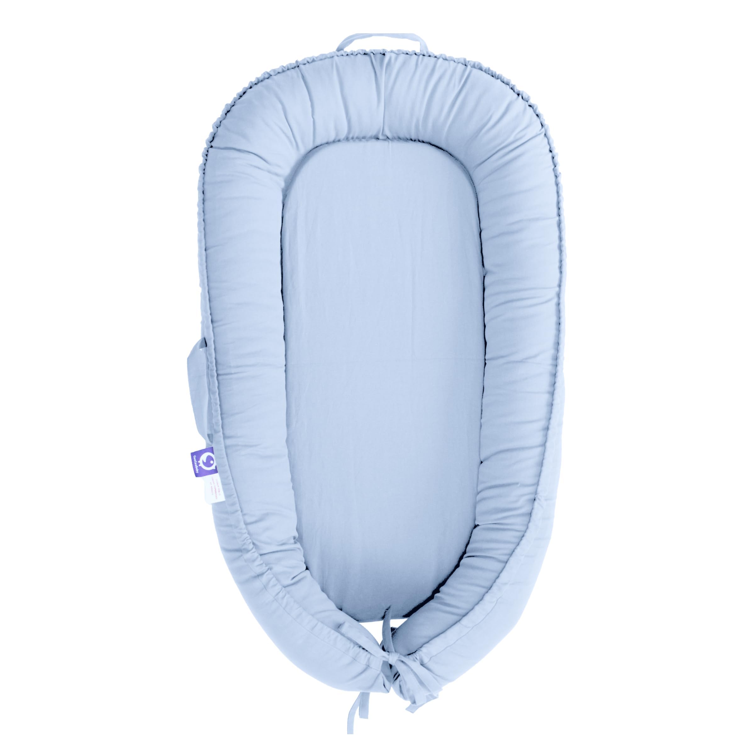 CooCooBaby infant lounger cover in baby blue, offering a cozy, hug-like feel.