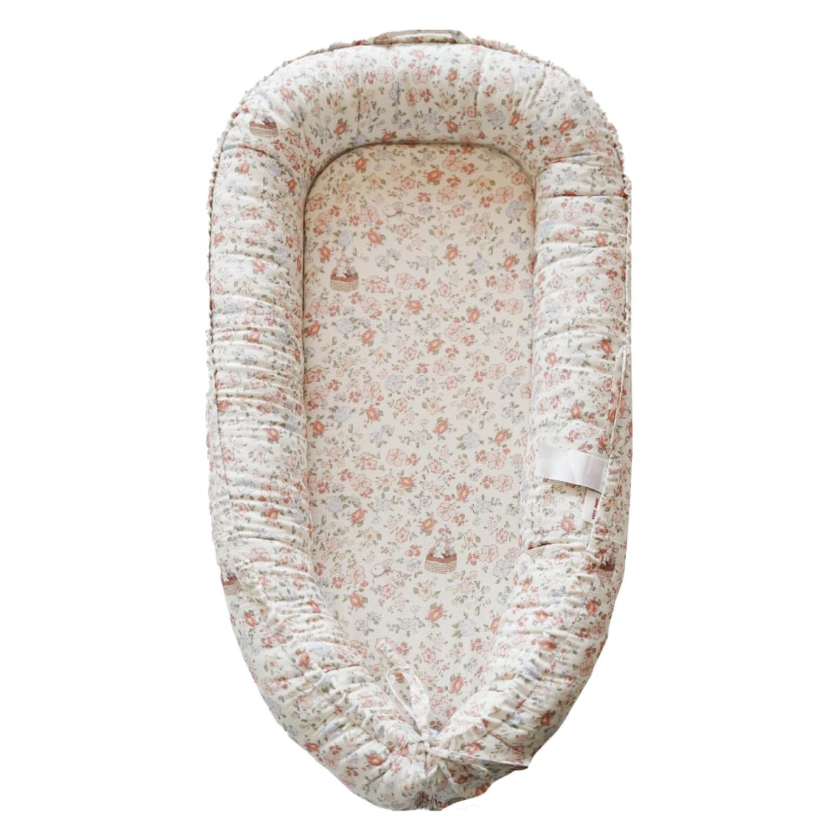 CooCooBaby infant lounger front view with Wonderland Muslin cover for gentle, breathable comfort.