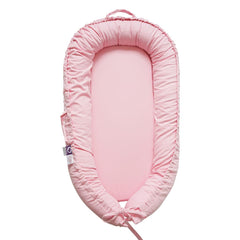 CooCooBaby infant lounger with misty rose cover offers breathable comfort for newborns