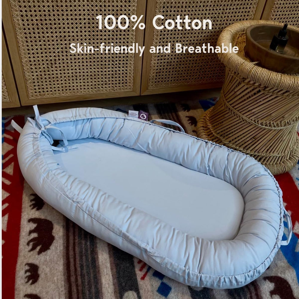 CooCooBaby lounger adjustable ends extended for growing babies.