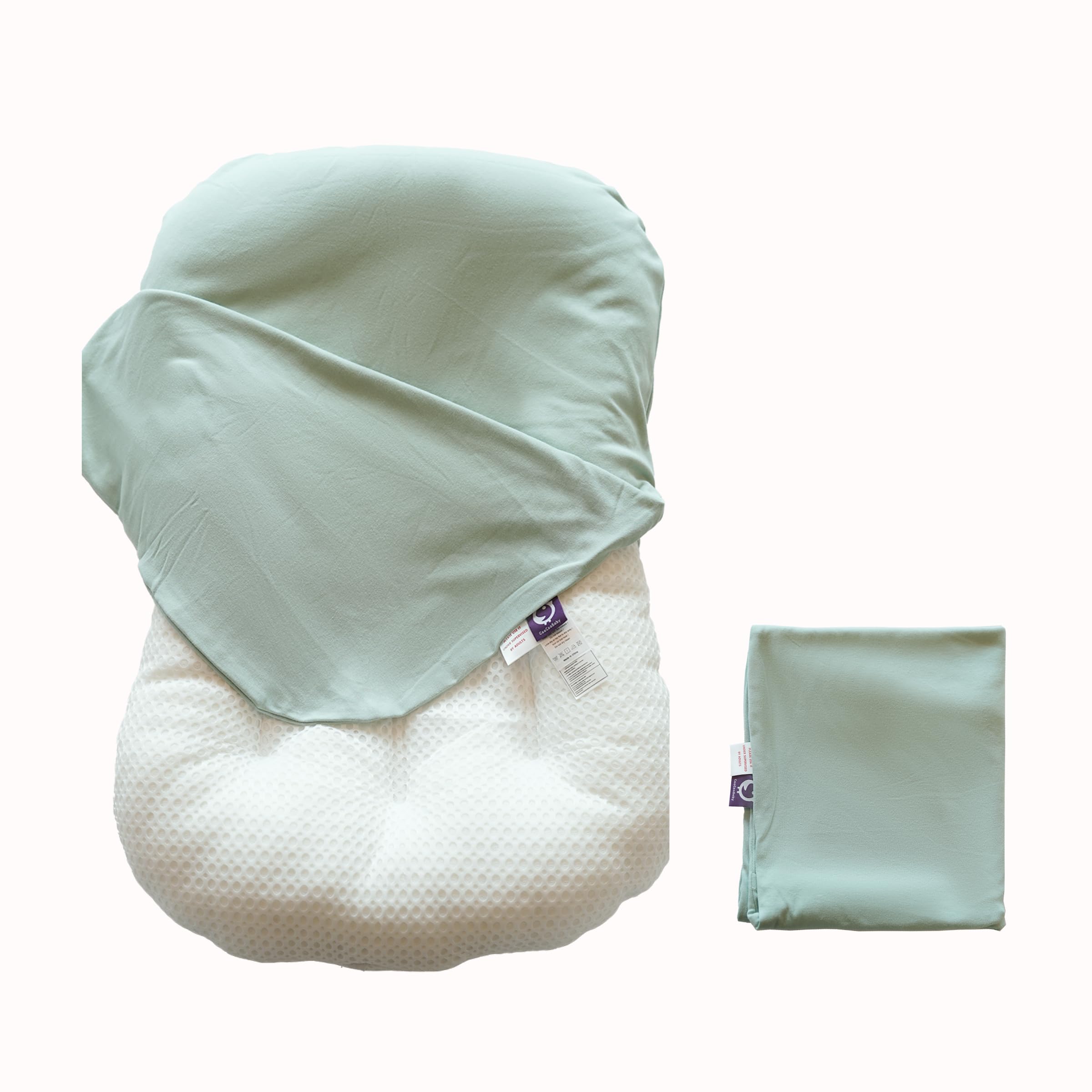 CooCooBaby sage green organic infant lounger cover cradling baby's skin.