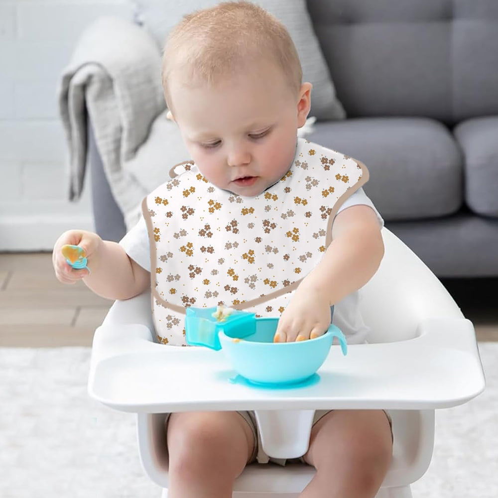 CoolaPeach spill-proof bibs reduce crumbs reaching clothes