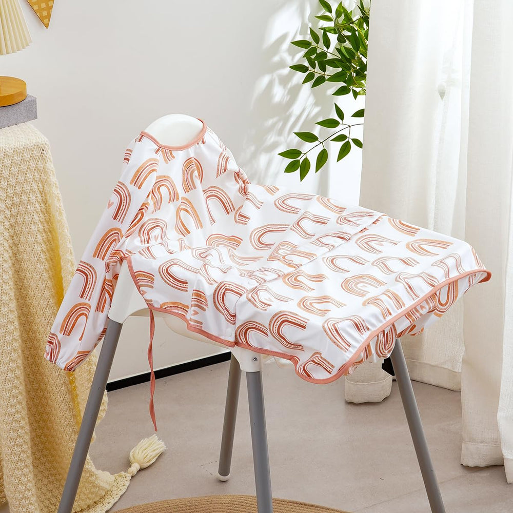 CoolaPeach waterproof bib prevents spills from reaching table and clothes