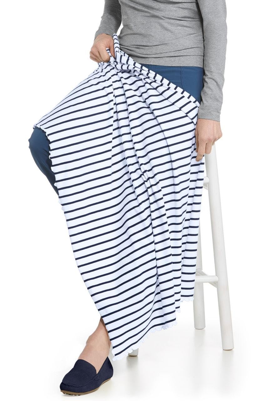 Closeup of Coolibar Sun Blanket white-navy stripe highlighting durable fabric.