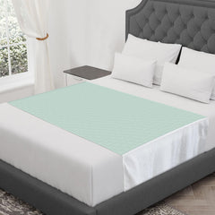 CoolShields waterproof bed pad covering 60x36 inches providing leak protection