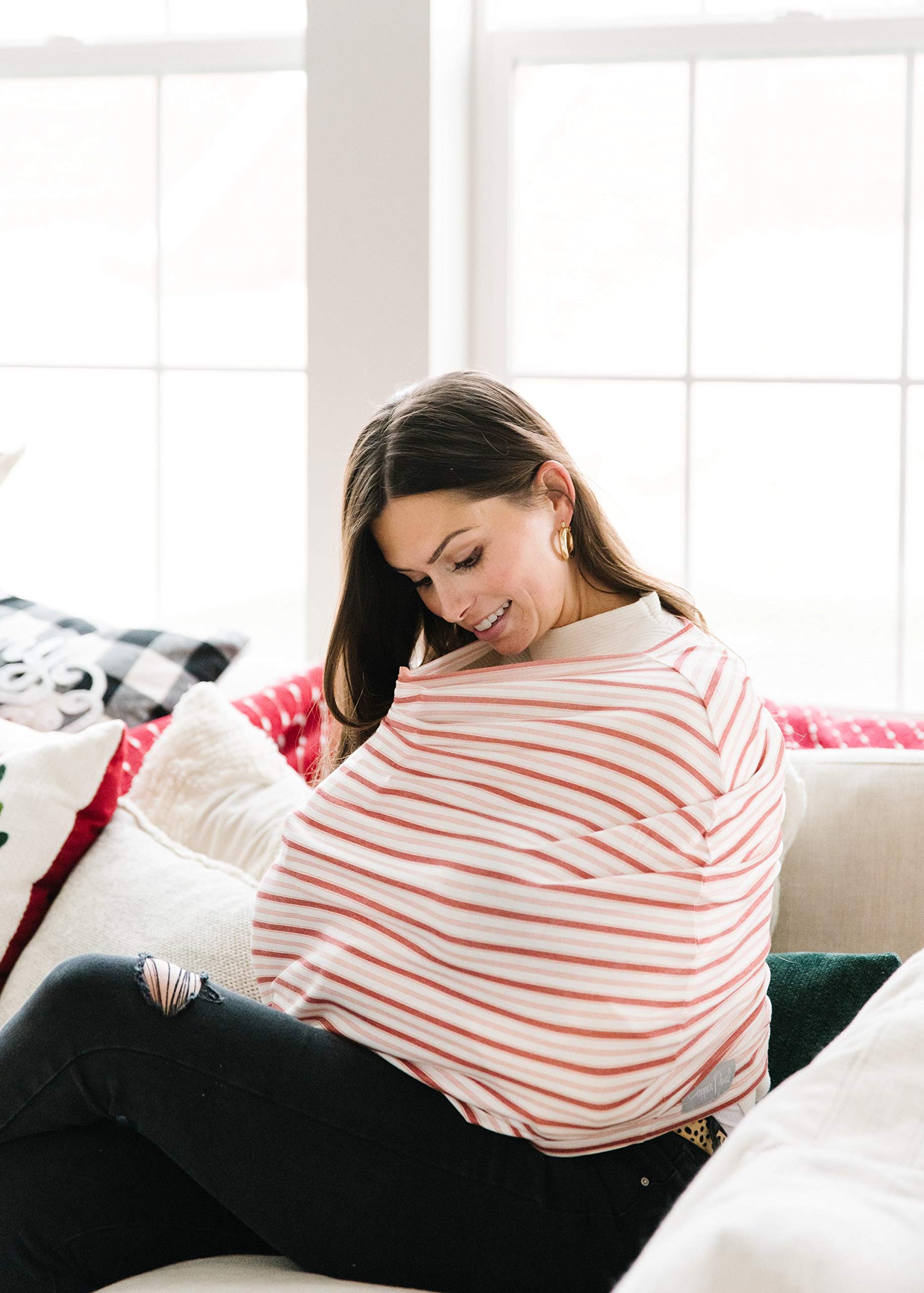 Copper Pearl 5-in-1 wrap adapts to seats and strollers.