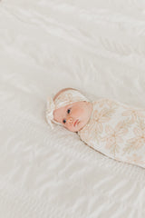Copper Pearl coordinated style with bows and swaddles