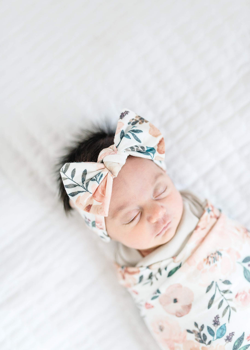 Gift-ready packaging makes Copper Pearl bows ideal for baby showers.