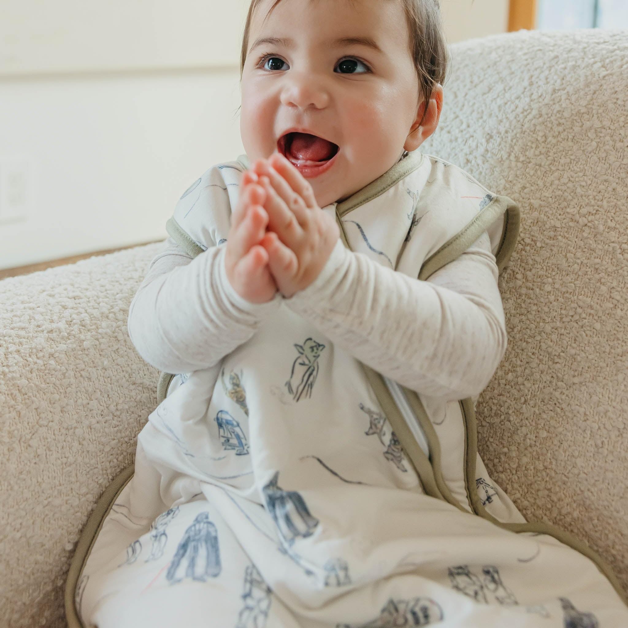Baby in Copper Pearl sleep bag showcasing breathable knit fabric