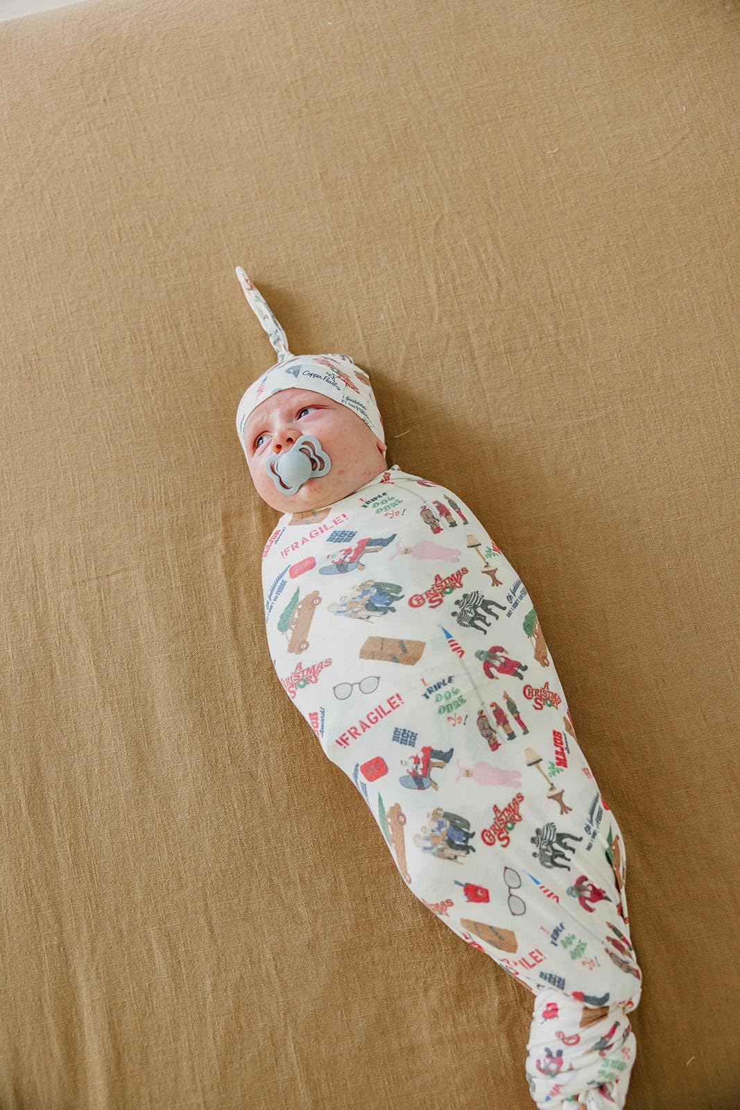 Copper Pearl swaddle blanket with fashion prints for stylish baby outfits.