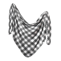 Copper Pearl soft-stretchy-knit swaddle blanket offers cozy newborn comfort.