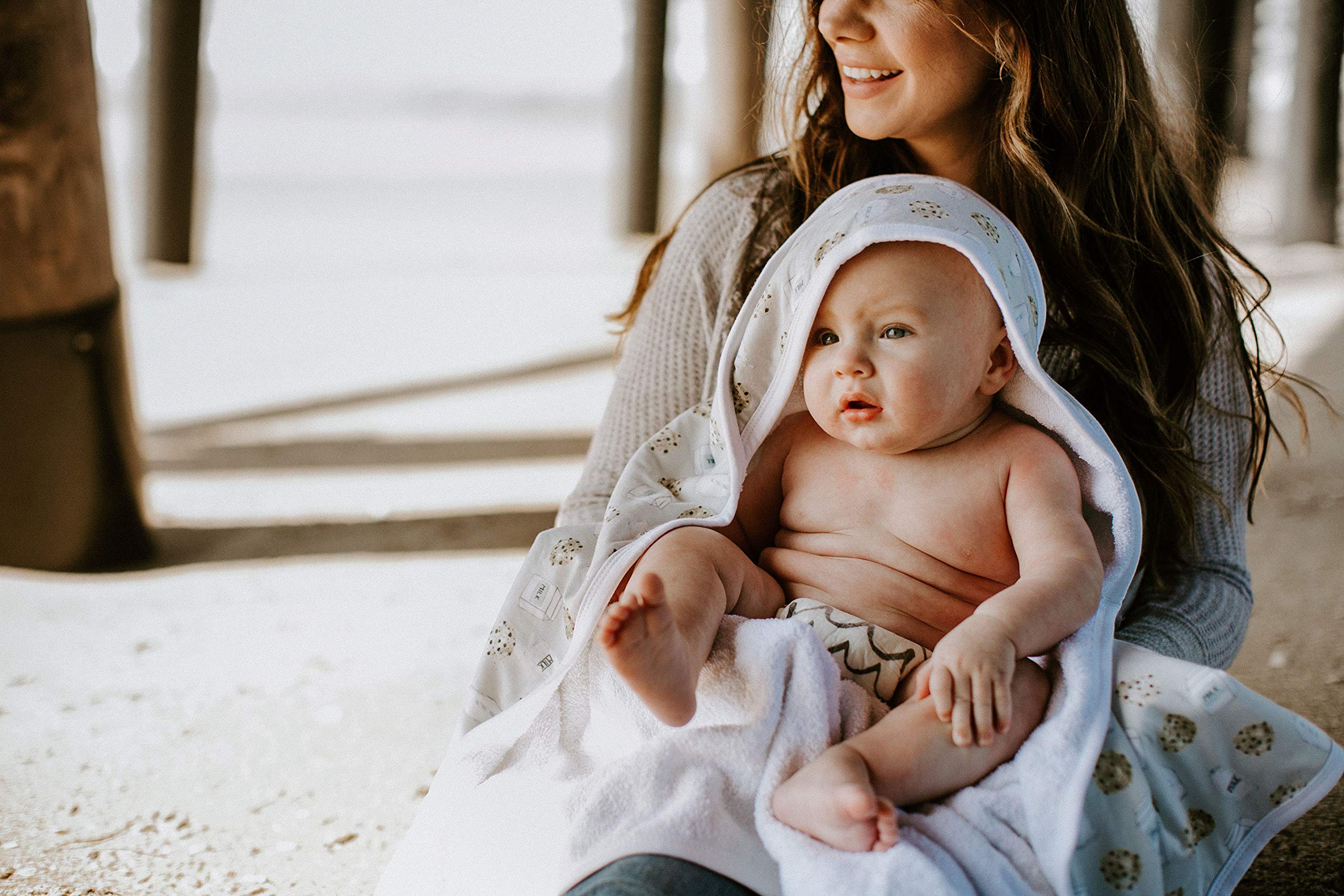 Copper Pearl hooded baby towel showcases stylish hooded design for everyday bath time.