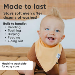 Copper Pearl bandana bib worn by a baby, keeping clothes clean during meals