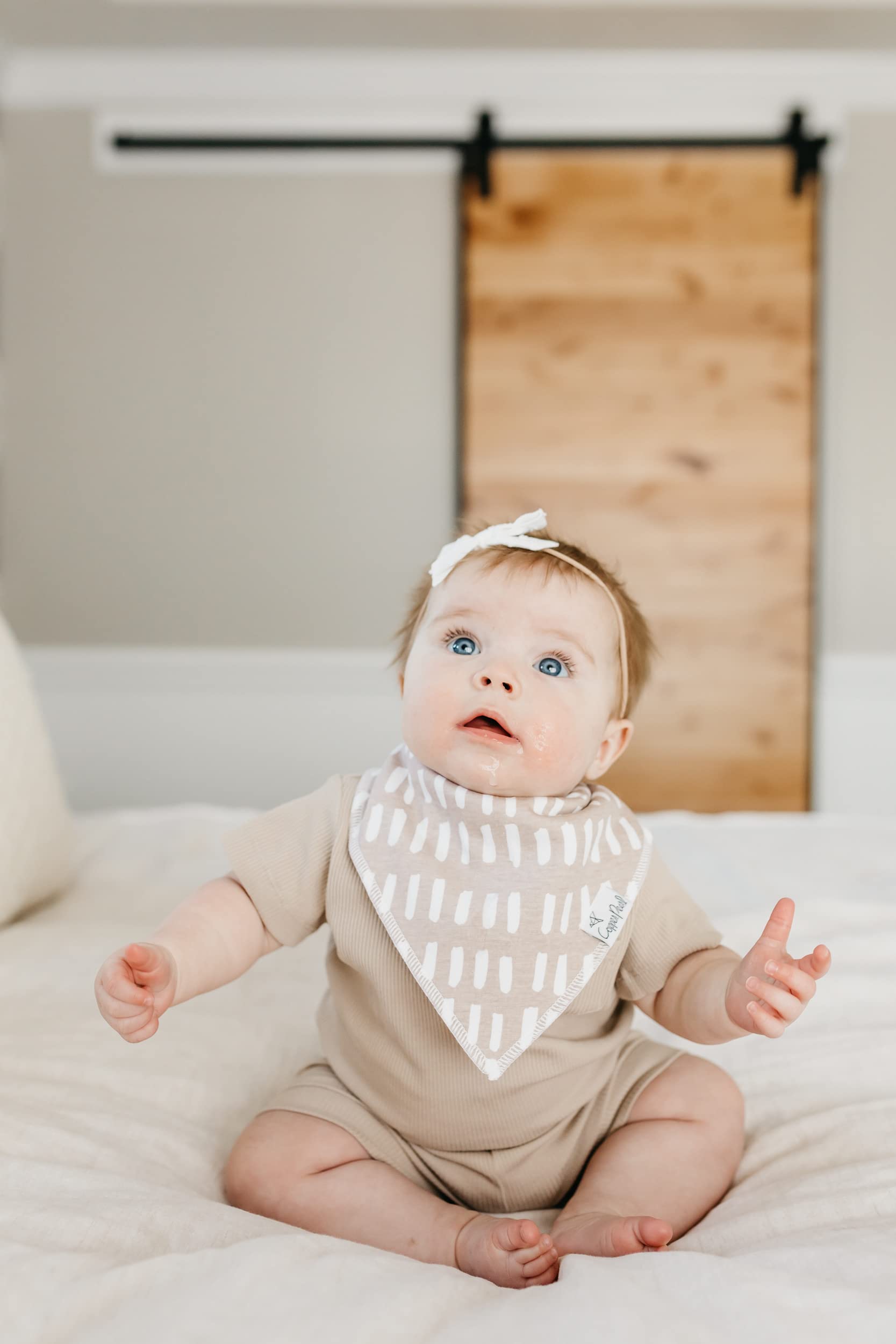 Copper Pearl Bliss bib highlights absorbent layers for heavy drool management.