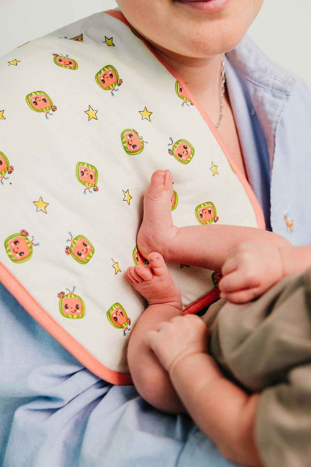 Copper Pearl burp cloths pair easily with outfits and nursery decor