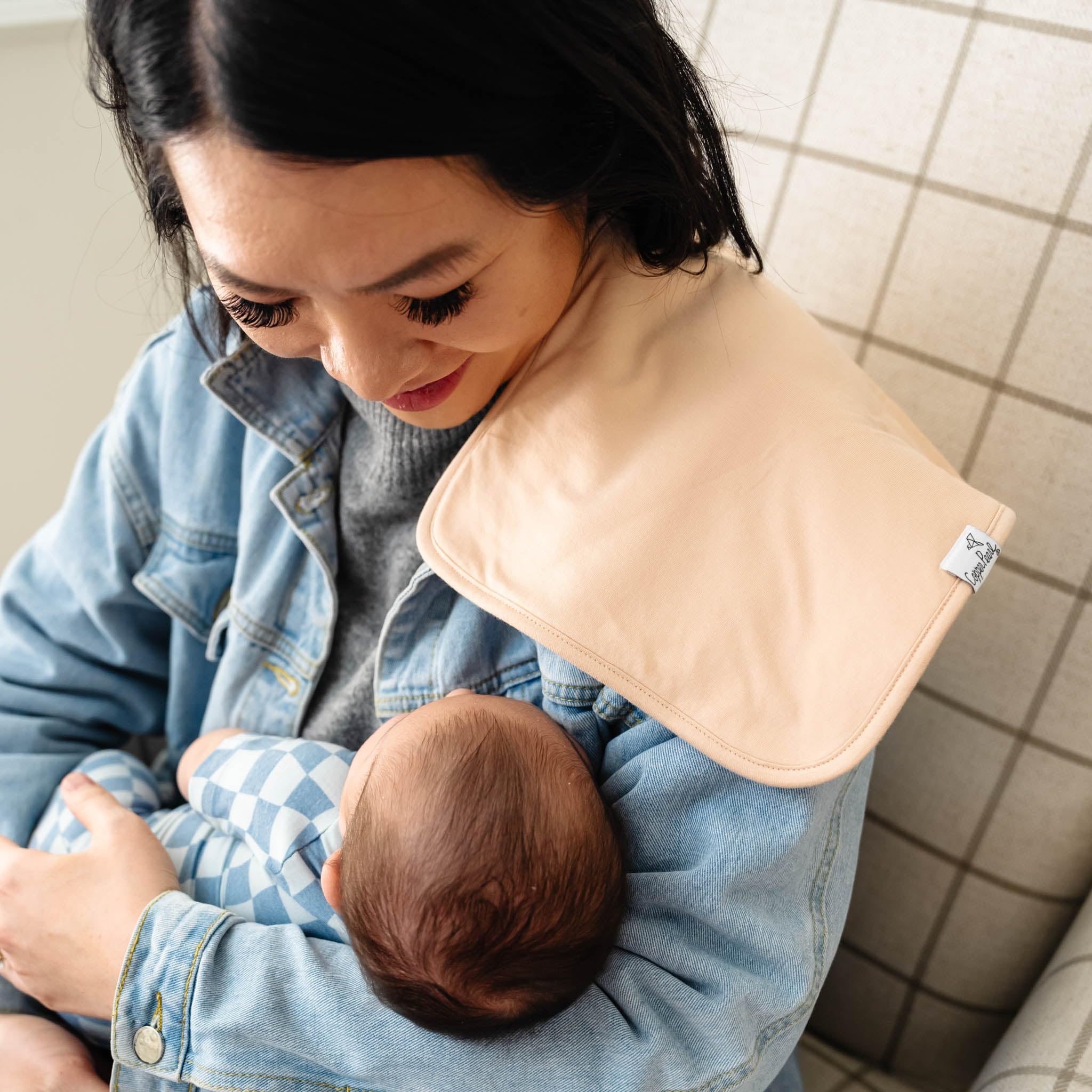Copper Pearl large burp cloth offers generous 21x10 inch coverage.