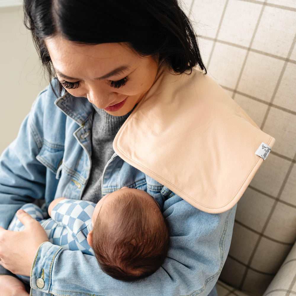 Copper Pearl large burp cloth offers generous 21x10 inch coverage.
