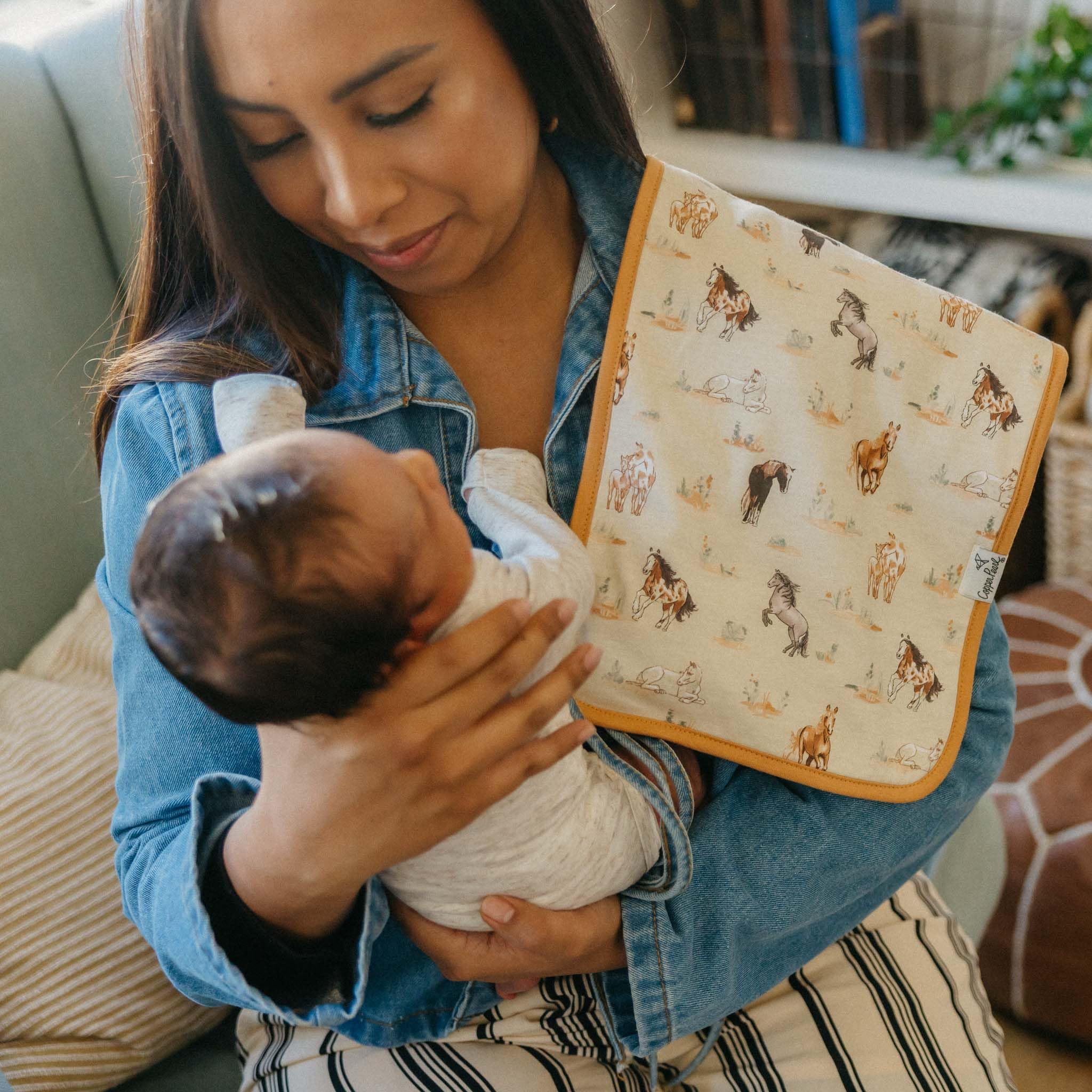 Copper Pearl burp cloth large paired with bandana bibs demonstrates coordinated accessory set